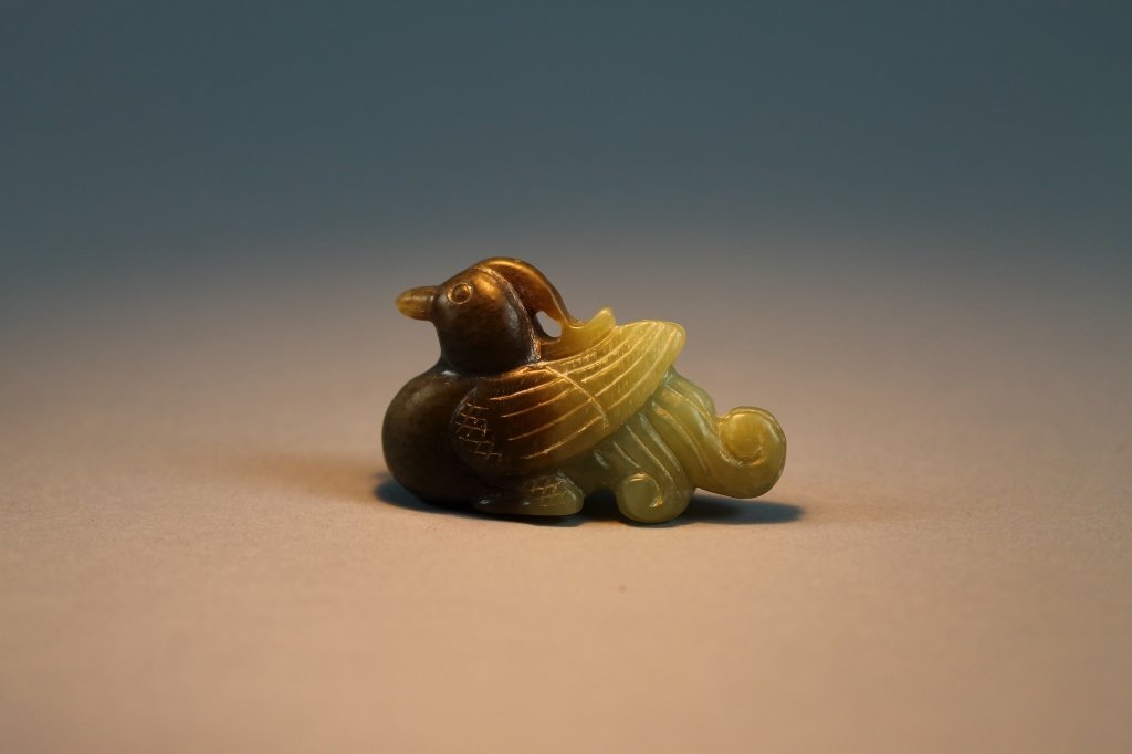 Chinese Qing Dynasty Green and Russet Jade Figure: Chinese Qing dynasty green and russet jade figure of a duck, measures (6.5cm) 2 1/2". We are proud to offer a fabulous collection of antique snuff bottles and Fine quality antique jade from the Blake