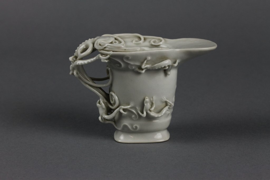 Chinese 18thc. Blanc de Chine Dragon Libation Cup: Important Chinese 18th Century Blanc de Chine Dragon Libation Cup with Fabulous applied Chilong Dragons in Very Good Condition; Measures ( 11.5cm) 4.5'' tall.------------------------------------------