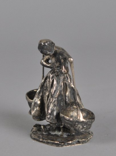 Carl Milles (1875–1955, Sweden) Silver Sculpture: Girl with Bucket Swedish Sterling Silver by Carl Milles ; Carl Milles (1875–1955, Sweden) Sterling silver maiden balancing two buckets between her shoulders. Cast at the Herman Bergman foundry. Sign