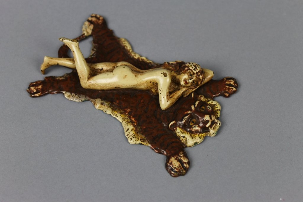 Franz Bergman Cold Painted Vienna Bronze Nude: Signed Franz Bergman cold painted Vienna bronze titled “The Lady on the Tiger Skin Rug.” Signed with Bergman's characteristic "Namgreb" (Bergman spelled backwards which he did on his erotic pieces