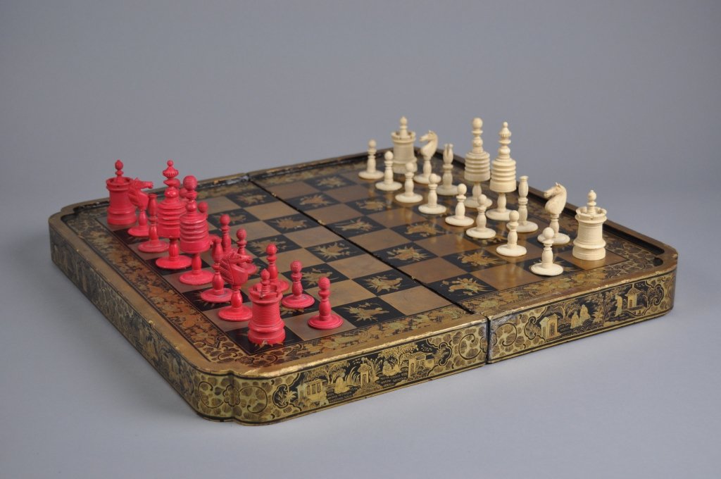 Chinese Qing Dynasty Chinoiserie Ivory Chess Set: Chinese 19th century Qing Dynasty Superb Quality Chinoiserie Ivory or bone Chess Set; when open measures (49cm x 49cm) 19.25" h x 19.25" w.