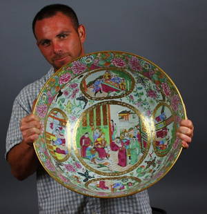 RARE CHINESE FAMILLE ROSE MANDARIN 21" PUNCH BOWL: RARE VERY LARGE 21 INCH CANTONESE FAMILLE ROSE MANDARIN PUNCH BOWL WITH THE FINEST PAINTING AND DETAIL THAT WE HAVE EVER SEEN ON THIS 19TH CENTURY BOWL; Decorated and gilt with shaped panels surrounde