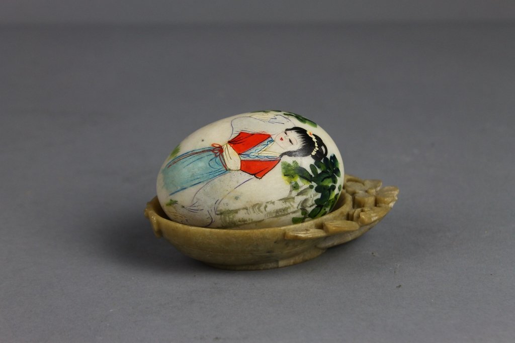 20th c.Chinese Hand Painted Alabaster Egg: Early 20th c.Chinese Hand Painted Alabaster Egg beautiful picture of Chinese maiden nestled in a soapstone carved egg holder; perfect condition.