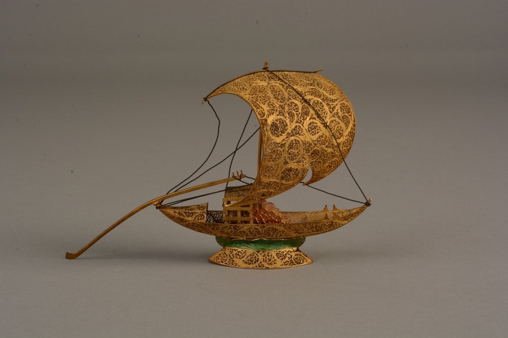 Vintage Chinese Silver and Enamel Filigree Ship: Vintage Chinese Silver and Enamel Filigree Ship on green enamel wavelike base carrying cargo; measures 4.75" (11cm)