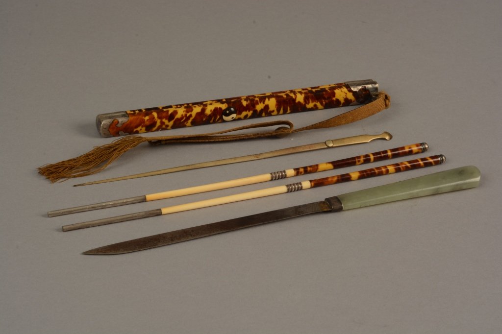 Japanese Tortoiseshell and Jade Chopsticks c.1850: Japanese circa 1850 tortoiseshell case and chopsticks, jade handled knife and opium spoon, , the nickel opium spoon with toothpick handle. Plated with silver decor and silk strap;measures 28cm (11 in.