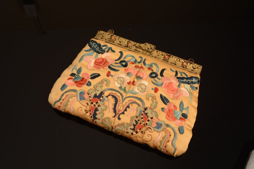 Victorian Chinese Silk Purse: Victorian sterling silver and antique Chinese embroidered silk purse from the early 1900s with original old mirror inside and decorated with coral beads. On a silver vermeil frame; measures 7" x 5.25"