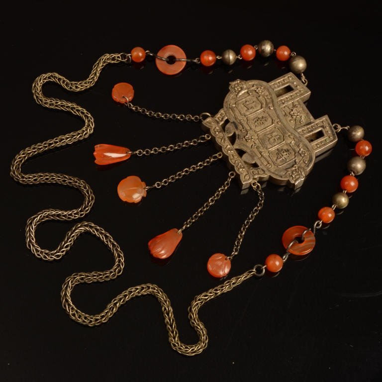 Chinese Qing Carnelian Silver Ruyi Lock Necklace: Chinese Qing dynasty silver and carved carnelian ruyi form lock necklace with carved carnelian beads in the form of peaches and buddha hands. Marked to the rear of pendant with two character marks. Me