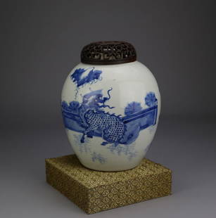 Chinese Transitional (1642-1663) Blue & White Jar: made during the reign of the Emperor Shunzhi in the mid 17th century. Painted to show a Kylin with lightning bolts, plantains (Banana Tree) , a fence and distant mountains. Shunzhi was emperor of Manc