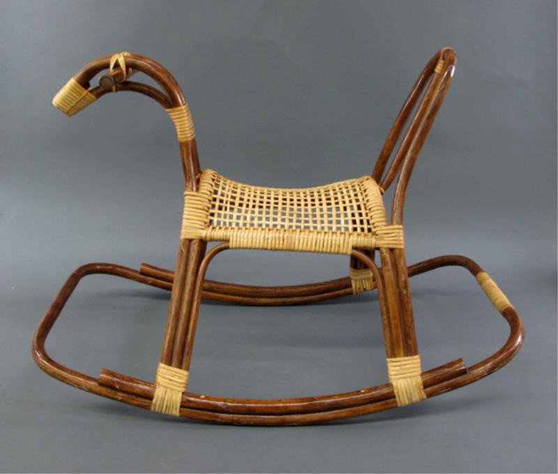 CHILDS ROCKING HORSE: - bentwood frame with woven wicker seat. 21 in. x 29 in. x 17 in.