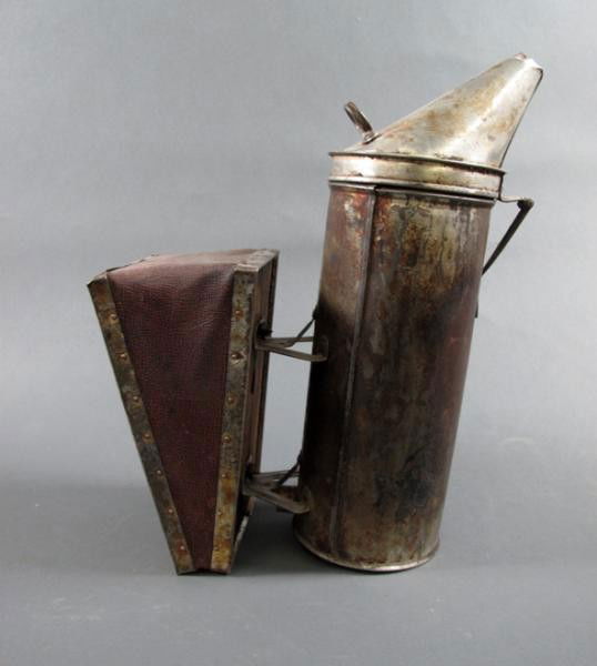 BEE SMOKER: - with leather cased bellows. Height: 11 1/2 in. Length: 12 1/2 in.