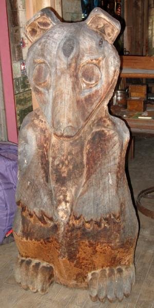 FIRST NATIONS CARVED REDWOOD BEAR -this bear figur: FIRST NATIONS CARVED REDWOOD BEAR -this bear figured prominently in a Ted Harrison painting, specifically created for the family.