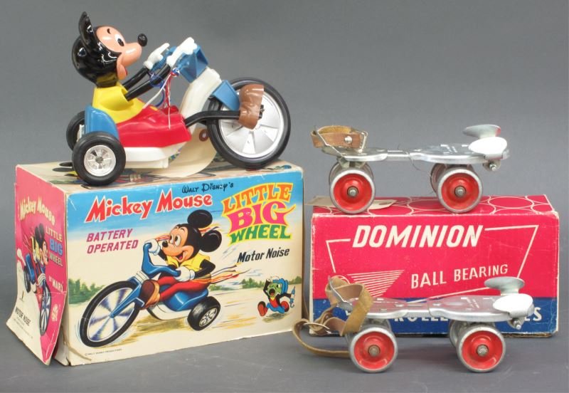 VINTAGE CHILDRENS TOY LOT (2): pair of vintage roller skates by Dominion Skate Co., Canada. Extendable skates come in Original box. Also, Mickey Mouse Little Big Wheel Motor Noise toy by Marx. Made in 1970 and comes in original box