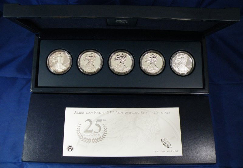 2011 ANNIVERSARY SILVER SET BOX + 5 OZ SILVER: 2011 Anniversary Silver Set genuine box + 5 oz Silver. Each coin is a genuine 1 ounce United States minted Silver Eagle silver dollar that originated not inside of the original US mint 2011 silver ann