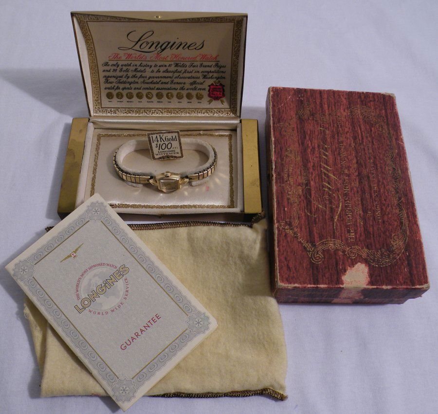 1954 LONGINES 14K GOLD WATCH BOX & PAPERS: This is the coolest, most pristine old set of paperwork that I have seen in quite some time. The value here is more that the box and the paperwork, it's in the watch which is in good working order. 19