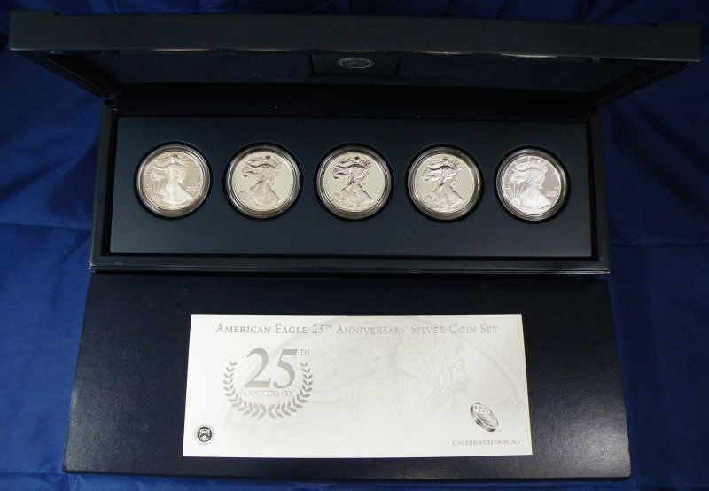 2011 ANNIVERSARY SILVER SET BOX + 5 OZ SILVER: 2011 Anniversary Silver Set genuine box + 5 oz Silver. Each coin is a genuine 1 ounce United States minted Silver Eagle silver dollar that originated not inside of the original US mint 2011 silver ann