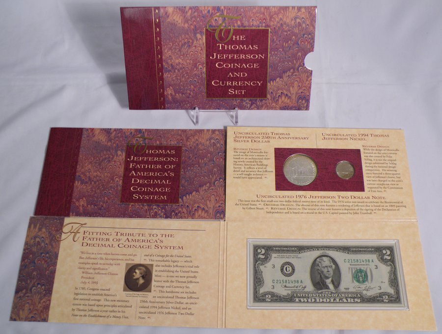 THE THOMAS JEFFERSON COINAGE & CURRENCY SET: Your winning bids will arrive exactly as shown in picture in lot catalog. THE THOMAS JEFFERSON COINAGE & CURRENCY SET EB (KVMM EB) Charity: Proceeds from items in this auction marked with an asterisk