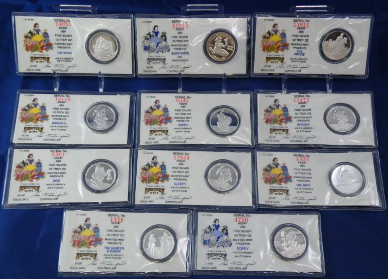11 WALT DISNEY SNOW WHITE 50TH ANNIVERSARY .999 F: Complete set of 11 Walt Disney's Snow White 50th Anniversary 1/2 ounce each .999 Fine Silver Rounds. Serial numbered limited edition. These come in the original plastic sleeve? along with the cert