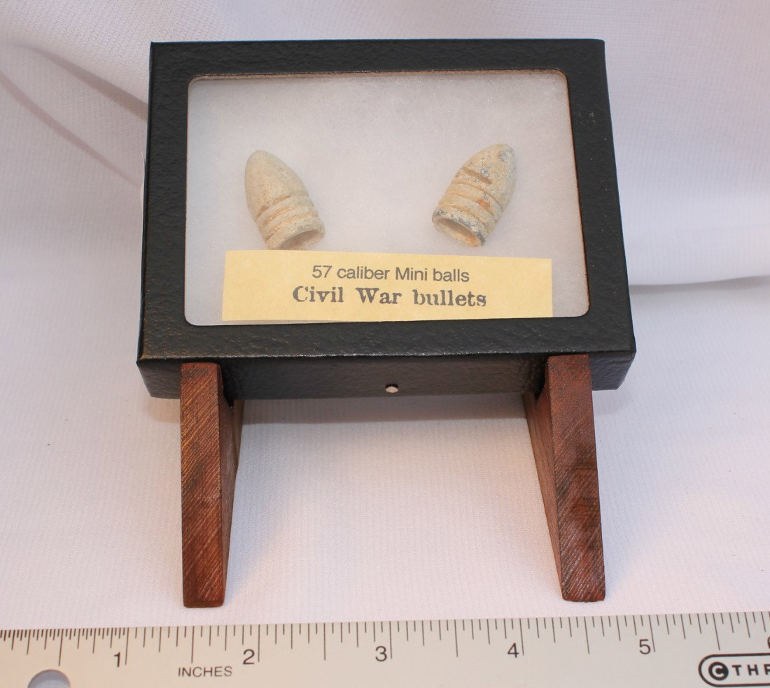 CIVIL WAR 57 CALIBER MINI BALLS #2: Two 57 caliber mini ball bullets in excavated condition. Found in Savannah Georgia. Shipping on this item is $5.50.