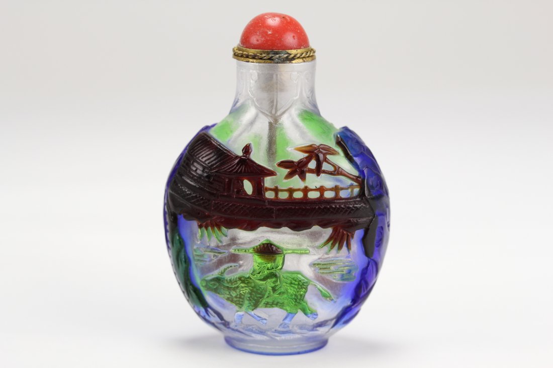 Very fine peking glass snuff bottle: Very fine peking glass snuff bottle carving with figures and scenery on three colors glasses. H:6.5cm