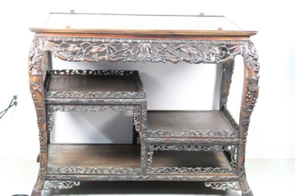 Antique red wood showing table: The antique red wood showing table. carving with squirrel and grape. Qing Dynasty.size:74 x 112 x 88cm