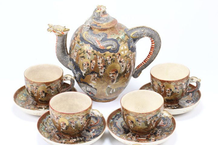 VERY FINE JAPANESE SATSUMA TEA SET: Very fine Japanese satsuma tea set with gold characters color pattern of porcelain dragon. With mark. Set of 9.