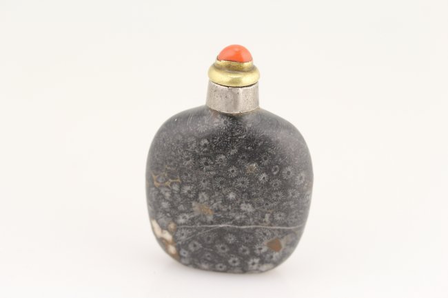 SNOWFLAKE STONE SNUFF BOTTLE: Snowflake stone snuff bottle mouth with extend silver. High quality old natural coral top cover.