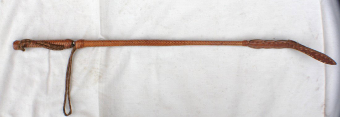 Edged Weapons: Dagger Sword/Quirt braided leather, in very good condition with some wear to leather