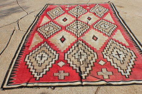 Native American Collectibles: Navaho Rug very large, over 10 feet Long, great design and colors, has damage and needs cleaning. This rug in good condition would bring over Twelve thousand dollars