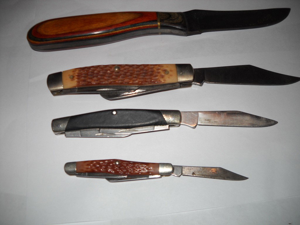 Edged Weapons: Lot of 4 Pocket Knives. One is marked Kabar,Buck and one marked Sears