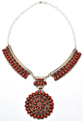Navajo Coral Cluster Necklace - Juliana Williams: Navajo Coral Cluster Necklace - Juliana Williams Measures 17" around. Pendant measures 2" in diameter. Side strips measure 3" long by 3/4" wide. Middle connector measures 1-1/8" tall by 1" wide. SKU: 