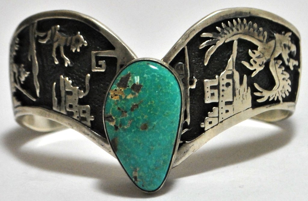 Old Pawn Turquoise Sterling Silver Storyteller Bra: Old Pawn Turquoise Sterling Silver Storyteller Bracelet SKU: br0961 Measures 5-5/8" around with a 1-1/8" gap, 1-1/2" wide (effective), 1-1/8" wide (max width at any point on the band). 