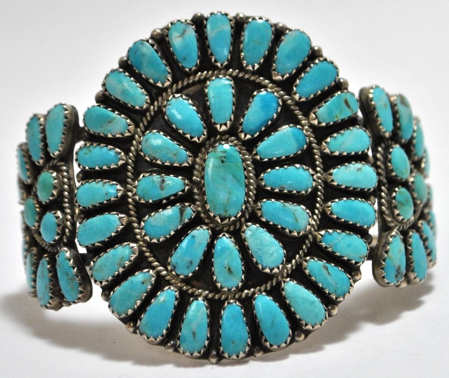 Old Pawn Navajo Turquoise Petit Point Cluster Ster: Old Pawn Navajo Turquoise Petit Point Cluster Sterling Silver Cuff Bracelet - Larry Moses Begay Measures 5-1/8" around with a 1-1/8" gap, 2" wide. Weight: 39.5g SKU: br1043