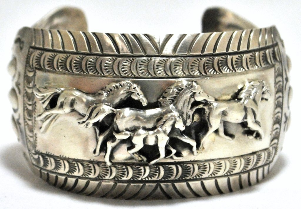 Old Pawn Navajo Trotting Horses Sterling Silver Cuff: Old Pawn Navajo Trotting Horses Sterling Silver Cuff Bracelet - Emer Thompson Measures 6-1/8" around with a 1-1/8" gap, 1-1/2" wide. Weight: 63.8g SKU: br1092