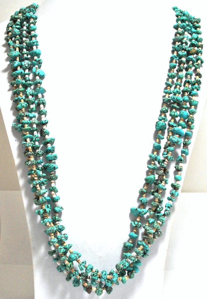 Old Pawn 4-Strand Turquoise & Heishi Shell Necklac: Old Pawn 4-Strand Turquoise & Heishi Shell Necklace Measures 34" around by 1/8" wide (shell strand). Turquoise stones measure from 1/4" to 1/2" wide. Weight: 173.2g SKU: ne0199