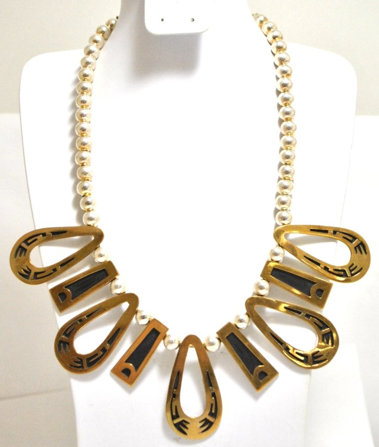 Navajo Brass over Sterling Silver Necklace - Tommy Sing: Navajo Brass over Sterling Silver Necklace - Tommy Singer Measures 17 around. Round pendants measure 1-7/8" tall by 1" wide. Rectangular pendants measure 1-1/4" tall by 1/2" wide. Weight: 85.7g SKU: n