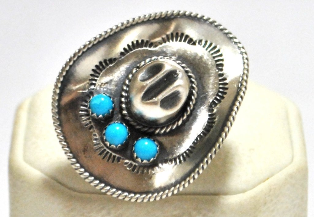 Old Pawn Navajo Turquoise Cowboy Hat Sterling Silver Wo: Old Pawn Navajo Turquoise Cowboy Hat Sterling Silver Women's Ring - Running Bear Face measures 1-3/8 tall by 1-1/8" wide. Size: 5.25 Weight: 10.3g SKU: rw0075"