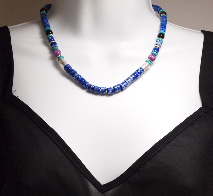 Navajo Denim Lapis Lazuli & Multi-Stone Necklace - Tomm: Navajo Denim Lapis Lazuli & Multi-Stone Necklace - Tommy Singer Measures 18 around by from 1/4" to 5/16" wide. Stones present: Denim Lapis, Sterling Silver Beads, Sugilite, Tiger's Eye, Onyx, Turquois