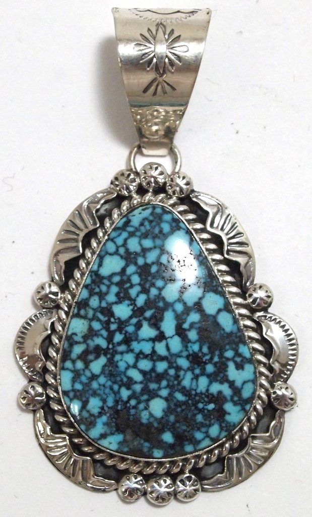 Navajo Spider Web Kingman Turquoise Sterling Silver Pen: Navajo Spider Web Kingman Turquoise Sterling Silver Pendant - Mary Ann Spencer Measures 2-1/2 tall by 1-1/2" wide including bale. Bale opening measures 1/2". Weight: 19.4g SKU: pp0686"