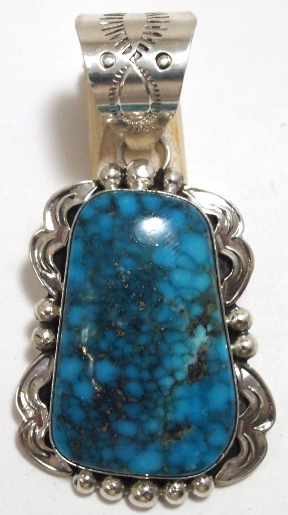 Navajo Spider Web Kingman Turquoise Sterling Silver Pen: Navajo Spider Web Kingman Turquoise Sterling Silver Pendant - Mary Ann Spencer Measures 2-1/2 tall by 1-1/4" wide including bale. Bale opening measures 1/2". Weight: 22.2g SKU: pp0687"