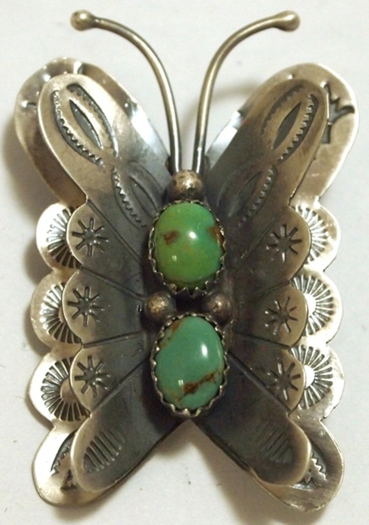 Navajo Turquoise Sterling Silver Butterfly Pendant & Pi: Navajo Turquoise Sterling Silver Butterfly Pendant & Pin - Tim Yazzie Measures 1-3/4 tall by 1-1/8" wide. Bale opening measures 1/4". Pin on back measures 3/4". Weight: 9.1g SKU: pp0991"