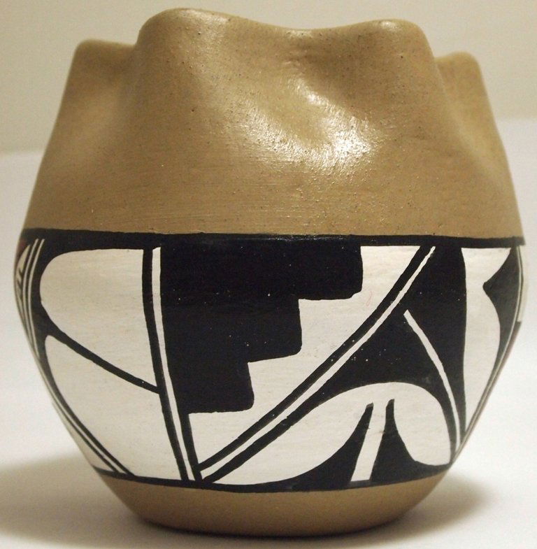 Hopi Hand Painted Pottery - Dan Yesslith: Hopi Hand Painted Pottery - Dan Yesslith Height: 4Opening Width: 2-3/8" (inside), 3" (rim)Circumference: 14"Maximum Width: 4-1/4"Bottom Width: 2-1/4"Our shipping costs for pottery are $8.99 within the