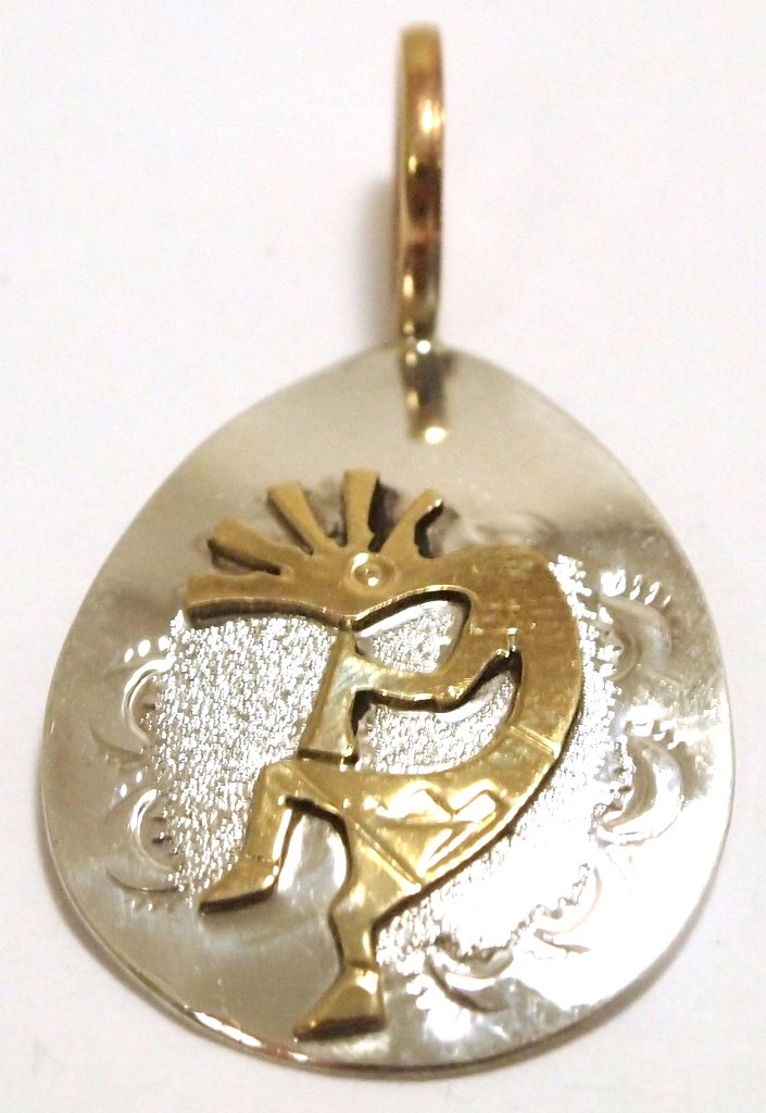 Navajo 12k Gold Fill Kokopelli Sterling Silver Pendant : Navajo 12k Gold Fill Kokopelli Sterling Silver Pendant - George Jones Measures 1-1/4 tall by 3/4" wide including bale. Bale opening measures 1/4". Weight: 1.5g SKU: pp0532"