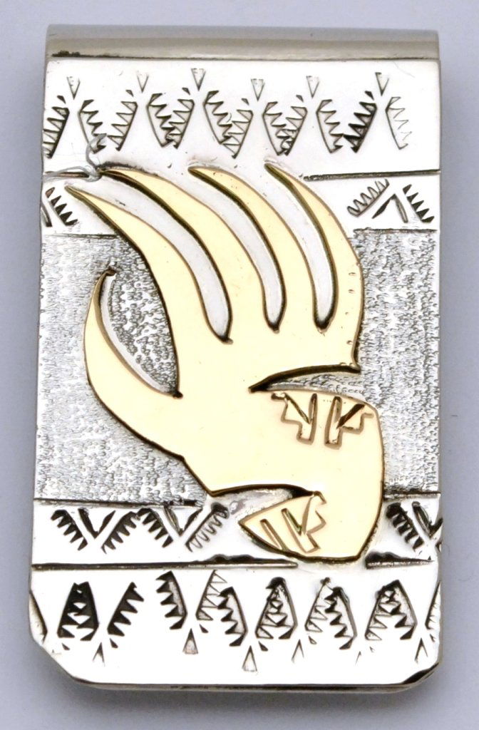 Navajo 12k Gold Fill Over Sterling Silver Bear Paw Mone: Navajo 12k Gold Fill Over Sterling Silver Bear Paw Money Clip - Roger Jones Measures 1-3/4 tall by 1" wide. Note: Money clips are nickel or stainless steel as purchased by the artist. The work