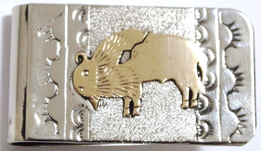 Navajo 12k Gold Fill over Sterling Silver Buffalo Money: Navajo 12k Gold Fill over Sterling Silver Buffalo Money Clip - Roger Jones Measures 1-3/4 tall by 1" wide.Note: Money clips are nickel or stainless steel as purchased by the artist. The work on top of