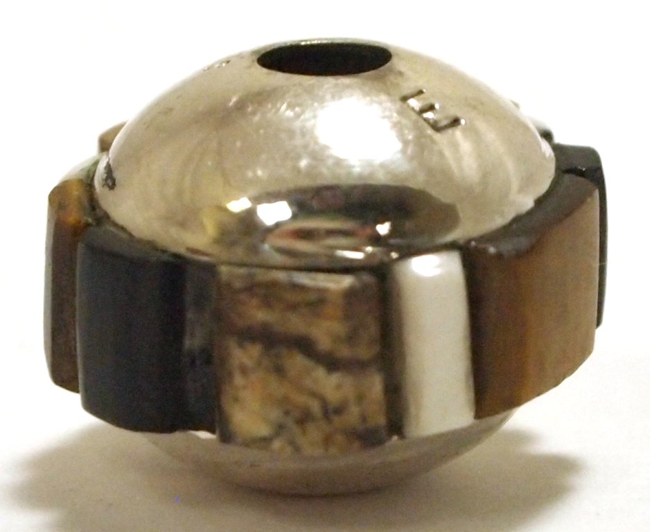 Navajo Multi-Stone Inlay Sterling Silver Pendant - Edis: Navajo Multi-Stone Inlay Sterling Silver Pendant - Edison Yazzie Measures 1/2 tall by 5/8" wide including bale. Hole going through pendant measures 1/8". Stones present: White Buffalo, Tiger's Eye, Ja