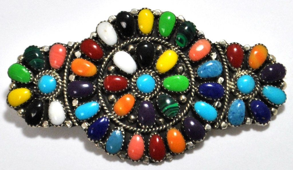 Navajo Multi-Stone Cluster Sterling Silver Hair Barrett: Navajo Multi-Stone Cluster Sterling Silver Hair Barrette - Juliana Williams Measures 2 tall by 3-1/2" wide. Barrette on back measures 2" long. Stones present: Coral, Turquoise, Malachite, Spiny Oyster