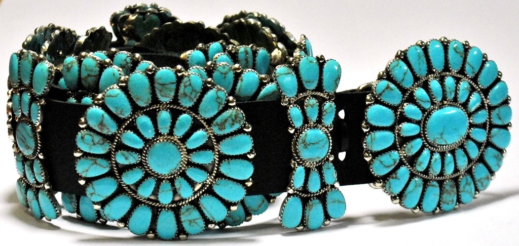 Navajo Turquoise Sterling Silver Concho Belt - Juliana : Navajo Turquoise Sterling Silver Concho Belt - Juliana Williams Belt measures 58 long. Large badges measure 2-1/2" tall by 2-1/2" wide. Small badges measure 2-1/2" tall by 1" wide. SKU: be0003"