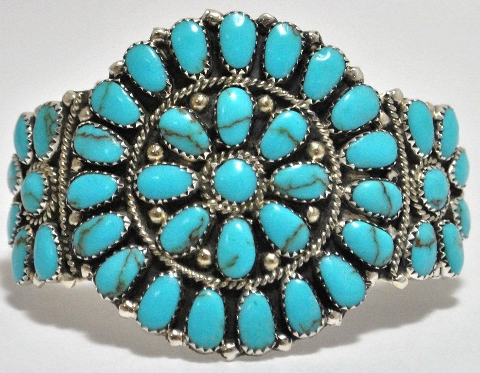 Navajo Turquoise Cluster Sterling Silver Cuff Bracelet : Navajo Turquoise Cluster Sterling Silver Cuff Bracelet - Juliana Williams Measures 5-1/4 around with a 1-1/4" gap, 2" wide. Weight: 30.1g SKU: br1089"