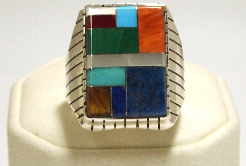 Navajo Multi-Stone Inlay Sterling Silver Men's Ring - R: Navajo Multi-Stone Inlay Sterling Silver Men's Ring - Ray Jack Inlay measures 7/8 tall by 9/16" wide. Band measures 3/16" wide, size: 13. Stones present: Spiny Oyster, Coral, Turquoise, Mother of Pear