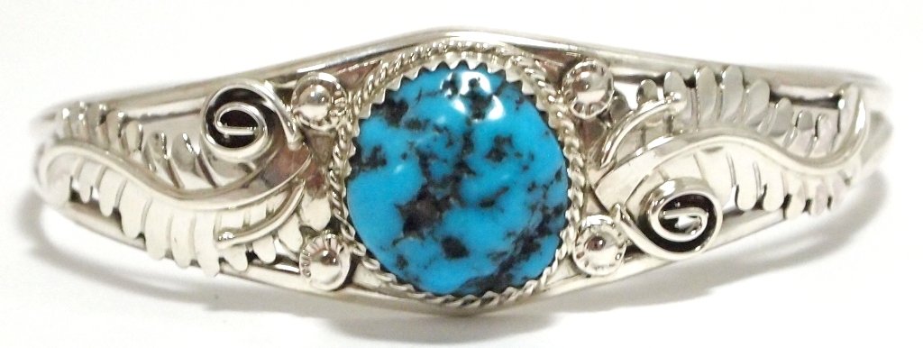 Navajo Sleeping Beauty Turquoise Sterling Silver Cuff B: Navajo Sleeping Beauty Turquoise Sterling Silver Cuff Bracelet - Renee Yazzie Measures 5-1/4 around with a 1-1/8 gap, 3/4" wide. Weight: 10.8g SKU: br1285"